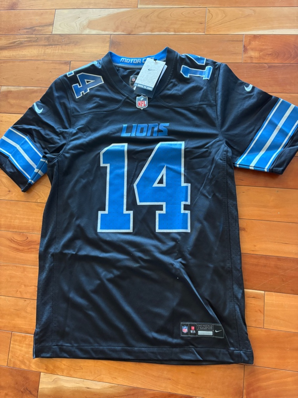 Amon-Ra St Brown Detroit Lions Alternate game jersey Black. Men's Small